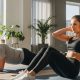 A-realistic-2026-fitness-lifestyle-scene-showing-a-fit-young-man-and-woman-exercising-at-home