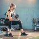 Fitness-asian-woman-doing-exercise-and-lifting-dumbbells-weights-at-sport-gym