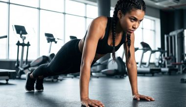 Sporty-woman-performing-push-ups-from-the-floor-in-the-gym